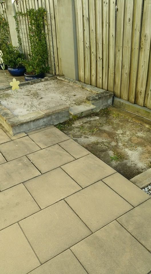 Paved steps and courtyard corner cleaned up