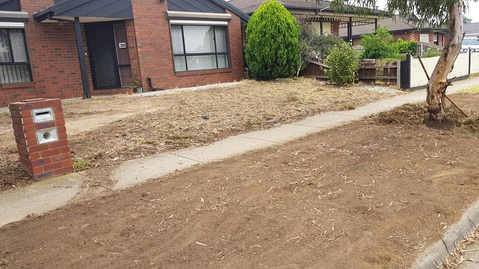 Front yard before turf preparation, bare soil